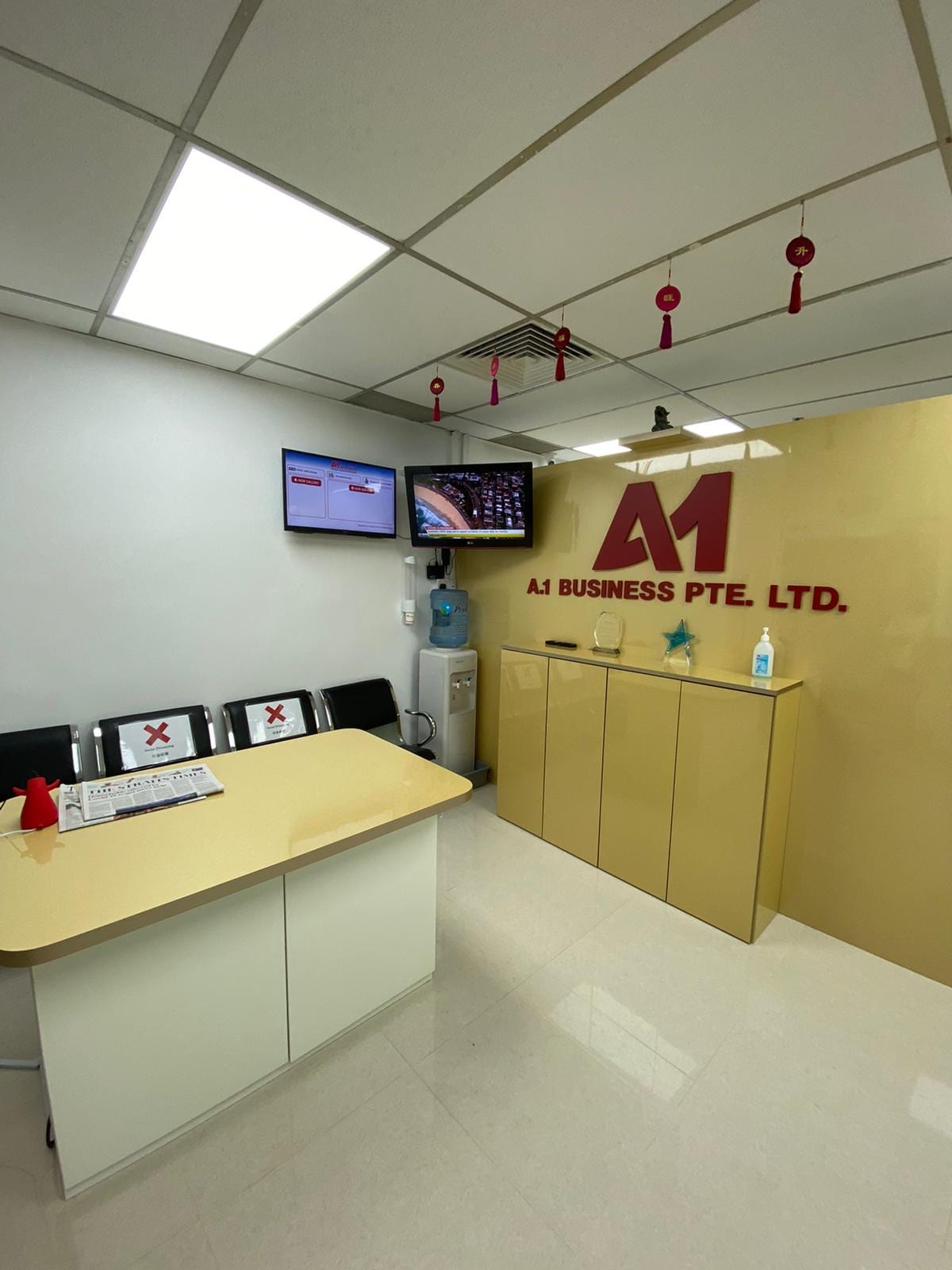 Inside the consultation office of A.1 Business Pte Ltd at 10 Anson Road